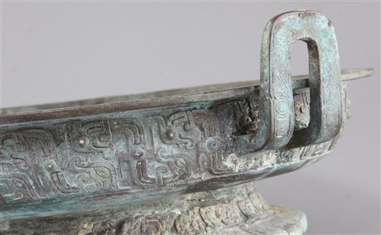 A Chinese archaic bronze ritual water basin, Pan, early Eastern Zhou dynasty, 8th-7th century B.C., 15cm high, 40.5cm, old repairs